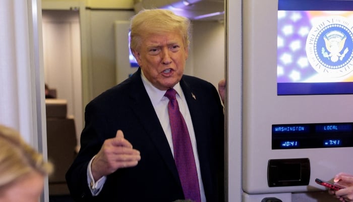 US President Donald Trump talks to members of the media aboard Air Force One en route to Joint Base Andrews, Maryland, US, April 17, 2026. — Reuters