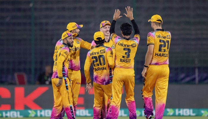 Peshawar Zalmi players celebrate a wicket during the PSL 11 match against Quetta Gladiators at National Bank Stadium, Karachi, on April 19, 2026. — PSL
