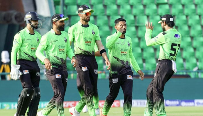 Lahore Qalandars players celebrate a wicket during their PSL 11 match against Quetta Gladiators at Gaddafi Stadium, Lahore, on April 21, 2026. — PSL