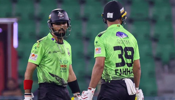 Lahore Qalandars batters Fakhar Zaman (right) and Sikandar Raza interact during the PSL 11 match against Peshawar Zalmi at Gaddafi Stadium in Lahore on April 25, 2026. — PSL