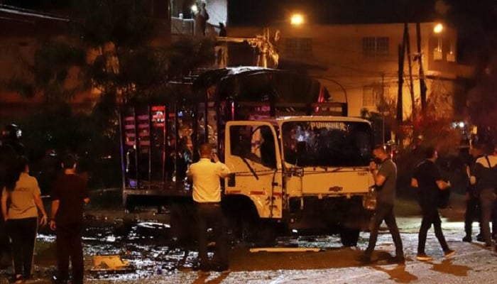 A destroyed truck of the Police Mobile Anti-Riot Squad (ESMAD) is seen after an explosion in Cali, Colombia, on January 7, 2022.— Reuters