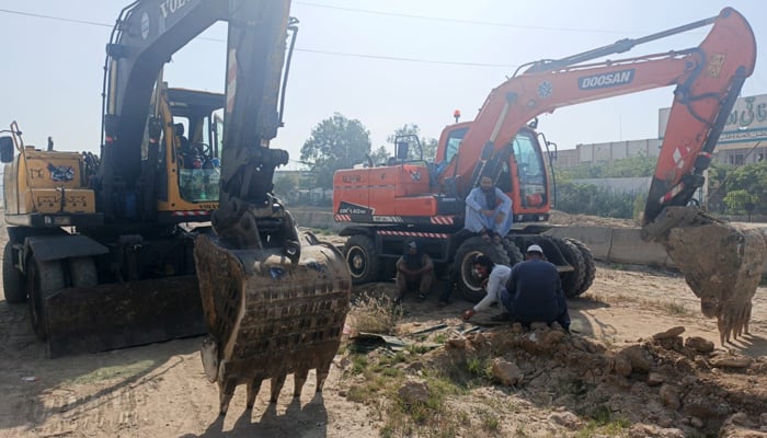 A view of the development work of Red Line underway with the help of heavy machinery at University Road in Karachi, April 26, 2026. — X/@murtazawahab1