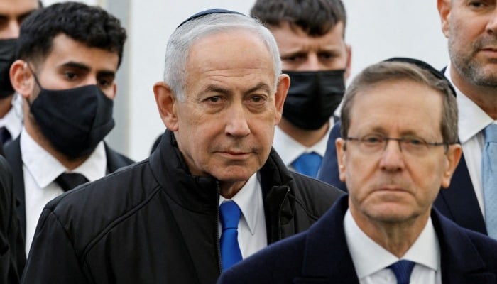 Israeli Prime Minister Benjamin Netanyahu and Israeli President Isaac Herzog attend a memorial service held for Ran Gvili, an off-duty police officer who was killed by Hamas members, in Meitar, Israel, January 28, 2026. — Reuters
