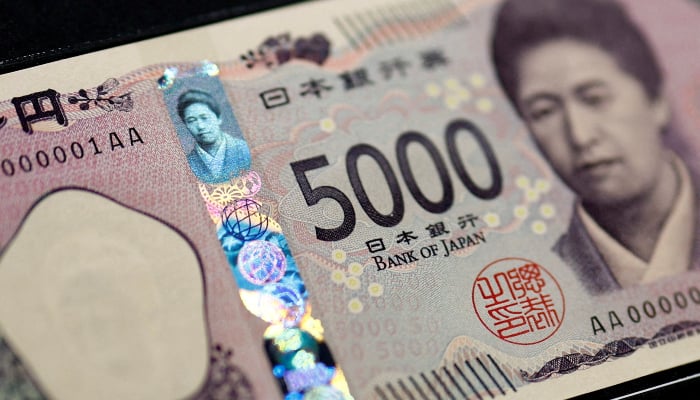 Holograms, which show different images and colours depending on the angle at which they are viewed, are seen on the new Japanese 5,000 yen banknote as the new note is displayed at a currency museum of the Bank of Japan, on the day the new notes of 10,000 yen, 5,000 yen and 1,000 yen went into circulation, in Tokyo, Japan, July 3, 2024. — Reuters