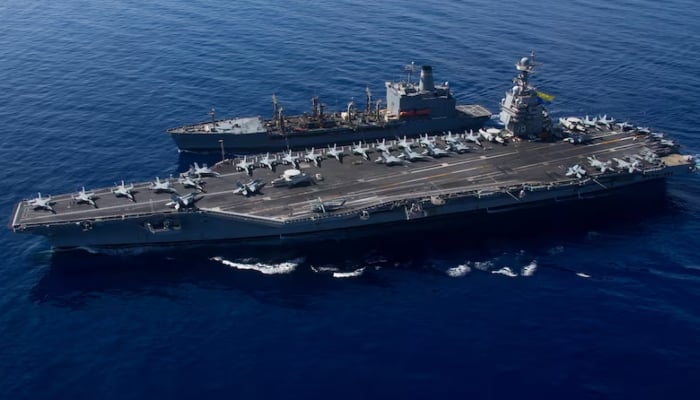 USS Gerald R. Ford steams alongside USNS Laramie (T-AO-203) during a fueling-at-sea in the eastern Mediterranean Sea, as a scheduled deployment in the US Naval Forces Europe area of operations, deployed by US Sixth Fleet to defend US, allied, and partners interests, in this photo taken on October, 11, 2023 and released by US Navy on October 14, 2023. — Reuters