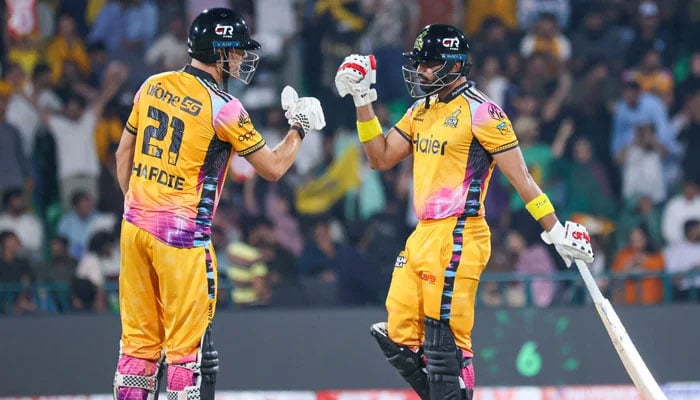 Peshawar Zalmis Aaron Hardie (left) and Abdul Samad bump fists during their PSL 11 final against Hyderabad Kingsmen at the Gaddafi Stadium in Lahore on May 3, 2026. — PSL