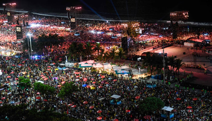 This aerial view shows fans gathering as DJ Vintage Culture performs ahead of the concert of Colombian singer Shakira, at Copacabana beach in Rio de Janeiro, Brazil, on May 2, 2026. — AFP