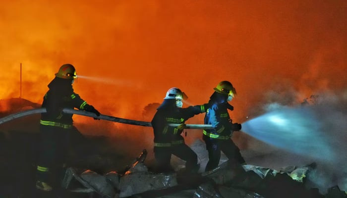 Firefighters work to distinguish a fire following a blast at a fireworks manufacturing factory in Liuyang, Hunan province, China, May 5, 2026. — Reuters