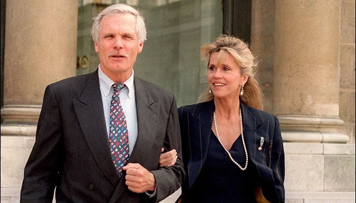 Media mogul Ted Turner and his wife, actress Jane Fonda, leave the Elysee Palace on May 18, 1994 in Paris after visiting the French President Francois Mitterrand. — AFP