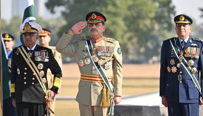 Field Marshal Syed Asim Munir (centre), Admiral Naveed Ashraf, Chief of the Naval Staff (left) and Air Chief Marshal Zaheer Ahmed Babar Sidhu, Chief of Air Staff at the General Headquarters in Rawalpindi on December 8, 2025. — ISPR