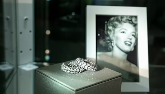 Marilyn Monroes belongings are displayed alongside a photograph during a preview ahead of an upcoming auction in Los Angeles, California, US, May 8, 2026. — Reuters