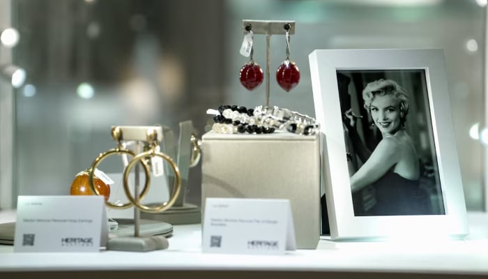 Memorabilia belonging to late model and movie star Marilyn Monroe is displayed alongside a photograph during a preview ahead of an upcoming auction in Los Angeles, California, US, May 8, 2026. — Reuters