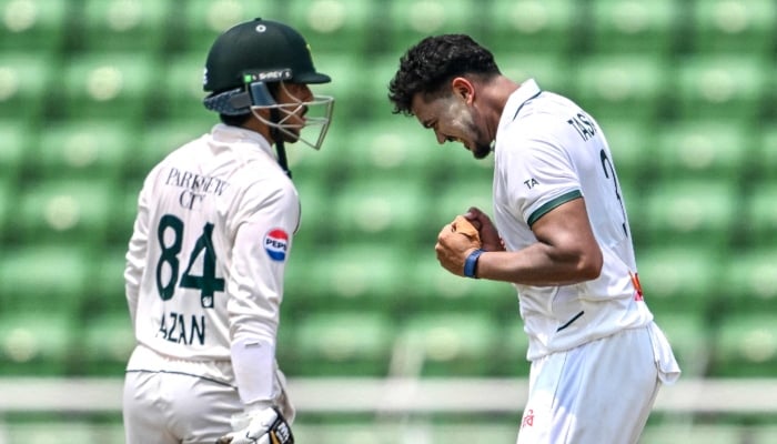 Bangladeshs Taskin Ahmed (right) celebrates after taking the wicket of Pakistans Azan Awais during the third day of the first Test at the Sher-e-Bangla National Stadium in Mirpur, Dhaka, May 10, 2026.  — AFP