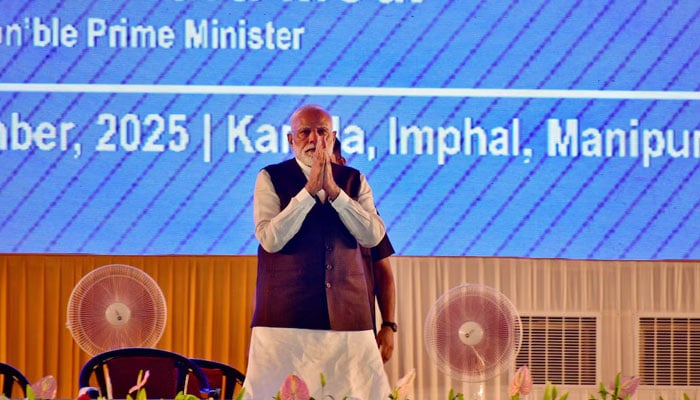 Indias Prime Minister Narendra Modi greets supporters upon his arrival at a public meeting in Imphal, in the northeastern state of Manipur, India, September 13, 2025. — Reuters
