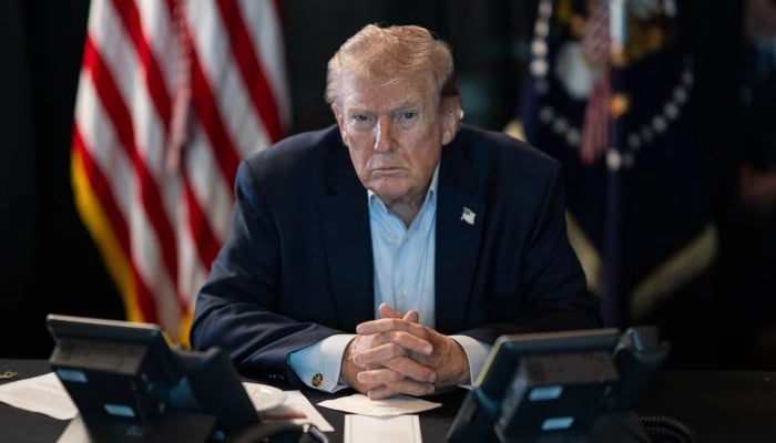 US President Donald Trump sits at a desk in the White House in Washington, DC, US, in this image dated April 6, 2026. — X/@WhiteHouse
