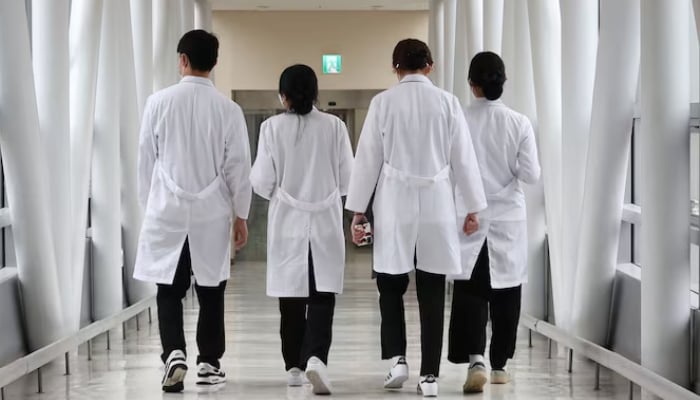 Medical workers walk at a hospital in Seoul, South Korea, February 19, 2024. — Reuters