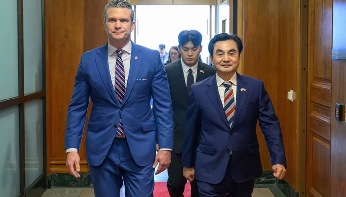 US Secretary of Defence Pete Hegseth walks with the Defence Minister of South Korea Ahn Gyu-back on May 11, 2026, in Seoul, South Korea. — Yonhap/File