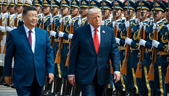 US President Donald Trump reviews the troops with the President of the People’s Republic of China Xi Jinping, in Beijing, China, May 14, 2026. — Reuters