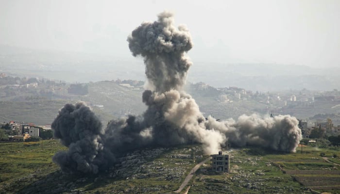 Smoke rises from the site of an Israeli airstrike that targeted the southern Lebanese village of Deir El Zahrani on May 13, 2026. — AFP