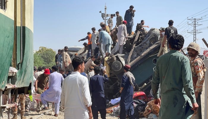 People gather as they search for survivors after a blast near a railway track in Quetta, May 24, 2026. — Reuters