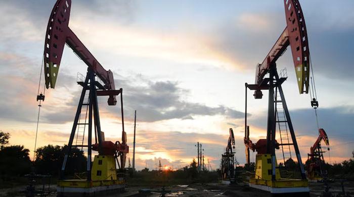 Oil slides, Asian shares climb amid hopes of US-Iran truce