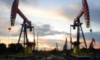 Oil slides, Asian shares climb amid hopes of US-Iran truce