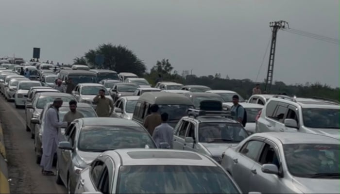 Traffic congestion is seen near the entrance of Islamabad airport on May 30, 2026. — X@AsadQaiserPTI