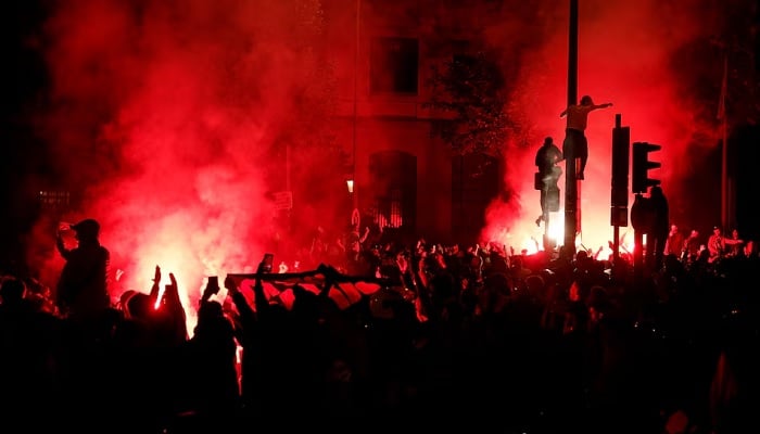 Paris St Germain fans celebrate after the club reached the UEFA Champions League final, in Paris, France, May 7, 2025. — Reuters