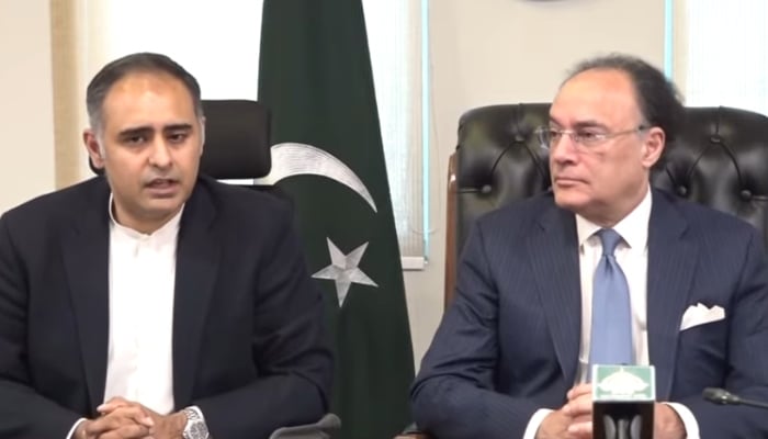 Minister of State for Finance Bilal Azhar Kayani (left) speaks during a joint press conference with Finance Minister Muhammad Aurangzeb, June 5, 2026. — Screengrab via YouTube/Geo News