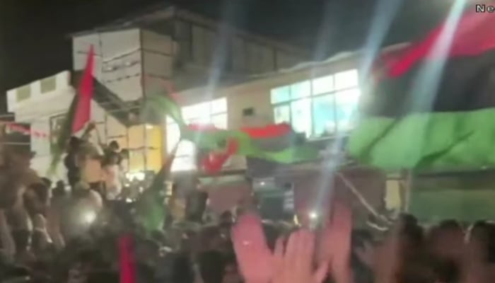 PPP supporters celebrate in Skardu after unofficial results declare the partys candidate winner. — Screengrab via Geo News Live