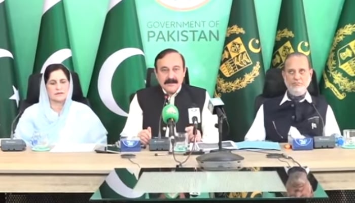 Federal Minister for Parliamentary Affairs Dr Tariq Fazal Chaudhry (centre) addresses a press conference in Islamabad, June 7, 2026. — Screengrab via YouTube/Geo News