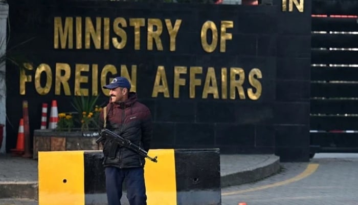 A Pakistani police officer stands guard outside the Ministry of Foreign Affairs in Islamabad on January 18, 2024. — AFP
