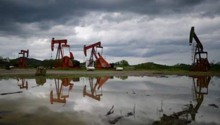 Pump jacks operate at an oil well run by Mexican state oil firm Pemex, where Indigenous communities in the Papantla region sit atop gas and oil deposits the government wants to exploit using hydraulic fracturing, or fracking, in Arroyo Florido, Veracruz state, Mexico, April 10, 2026. — Reuters