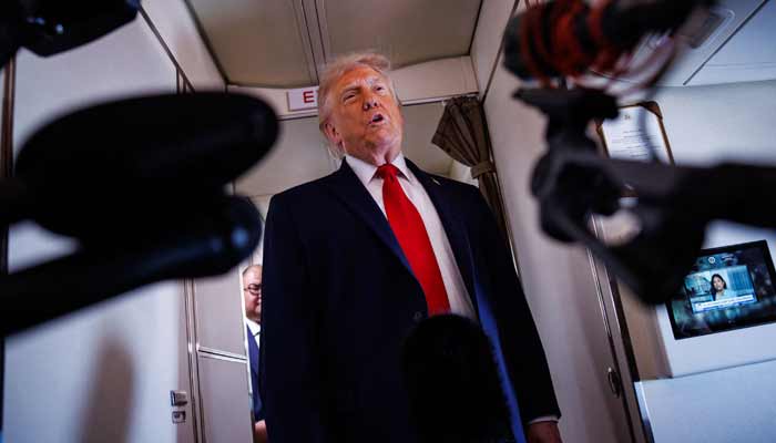 US President Donald Trump speaks with reporters while aboard Air Force One on June 5, 2026 en route to Chippewa Falls, Wisconsin. — AFP/File