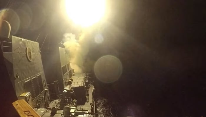 USS Michael Murphy (DDG 112) launches Tomahawk cruise missiles from an unknown location in this still image obtained from a handout video released on Jun 10, 2026. — Reuters