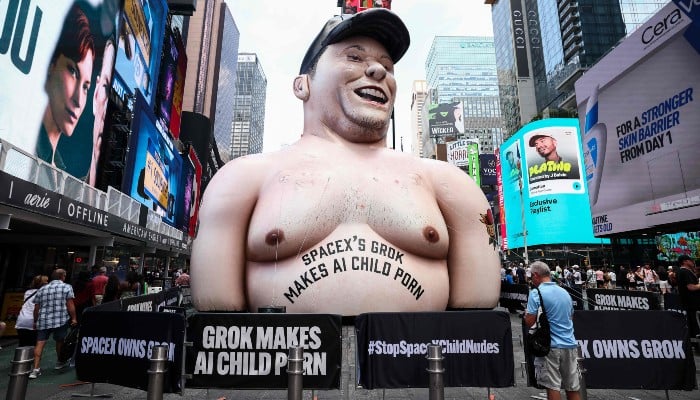 An inflatable effigy of SpaceX CEO Elon Musk, protesting Musks Grok AI, stands in Times Square in New York City, US, on June 11, 2026. — AFP