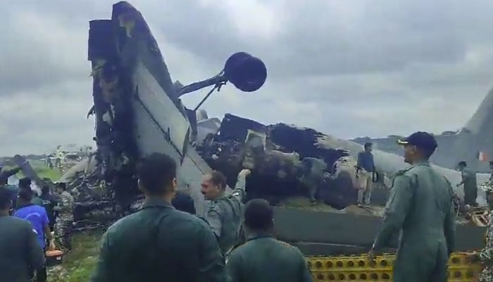 Debris of a Russian-made Indian military plane An-32 crashed while landing at Jorhat on June 13, 2026. — Indian media