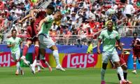 Qatar earn first ever World Cup point with late goal