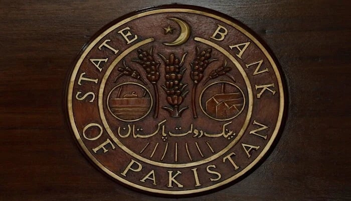 A logo of the State Bank of Pakistan (SBP) is pictured on a reception desk at the head office in Karachi, July 16, 2019. — Reuters