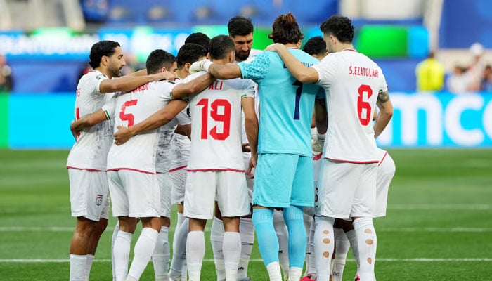 Iran players form a huddle on the pitch before the Group G match between Iran and New Zealand in Los Angeles Stadium, Inglewood, California, US on June 15, 2026. — Reuters
