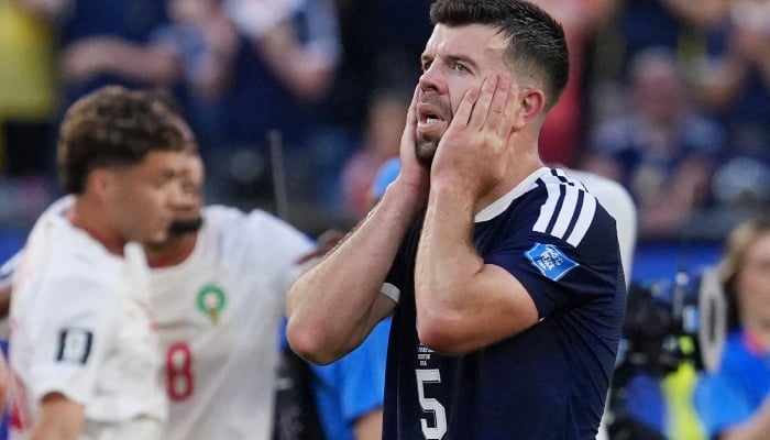 Scotlands Grant Hanley looks dejected after the match. — Reuters