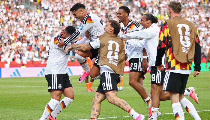 Germanys forward #26 Deniz Undav (L) is congratulated by teammates after scoring his teams second goal during the 2026 World Cup Group E football match between Germany and Ivory Coast at the Toronto Stadium in Toronto, Canada, on June 20, 2026. — AFP