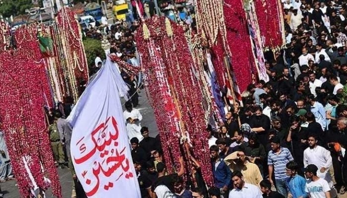 A large number of mourners attending the 9th Muharram procession in Islamabad. — APP/File
