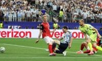 Majestic Messi makes history as Argentina continue title defence