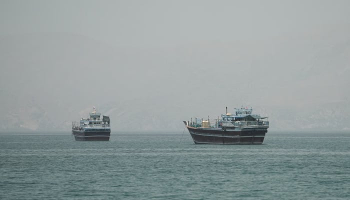 Vessels at the Strait of Hormuz, as seen from Musandam, Oman, June 24, 2026. — Reuters