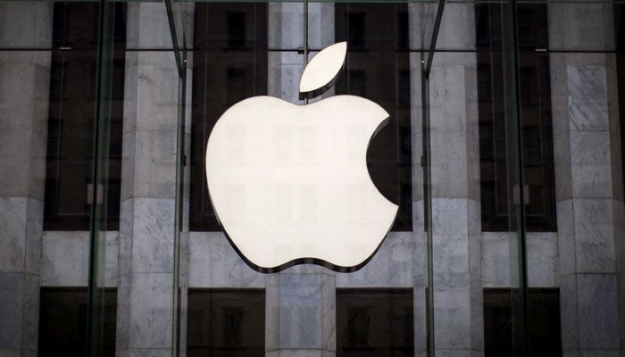An Apple logo hangs above the entrance to the Apple store on 5th Avenue in the Manhattan borough of New York City, July 21, 2015. — Reuters