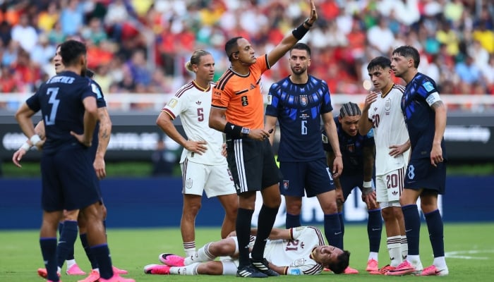 Spains Mikel Oyarzabal reacts after sustaining an injury as referee Ismail Elfath looks on during Uruguay vs Spain match of Fifa World Cup 2026 at Estadio Guadalajara, Guadalajara, Mexico, June 26, 2026. — Reuters