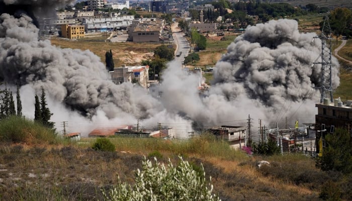 Smoke billows from southern Lebanon following an Israeli strike, as seen from Nabatieh, Lebanon, June 13, 2026. — Reuters