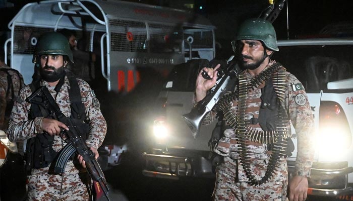 Paramilitary soldiers cordon off the streets around the Mosamiat Chowrangi area after a militant attack on Pakistans Rangers compound in Karachi, June 27, 2026. — AFP
