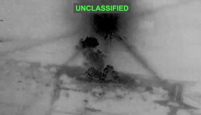 Smoke rises from explosions at an unknown location, following what US Central Command said were strikes on Iran in response to an Iranian drone strike on a cargo ship in the Strait of Hormuz, in this screen grab from video released June 26, 2026. — Reuters